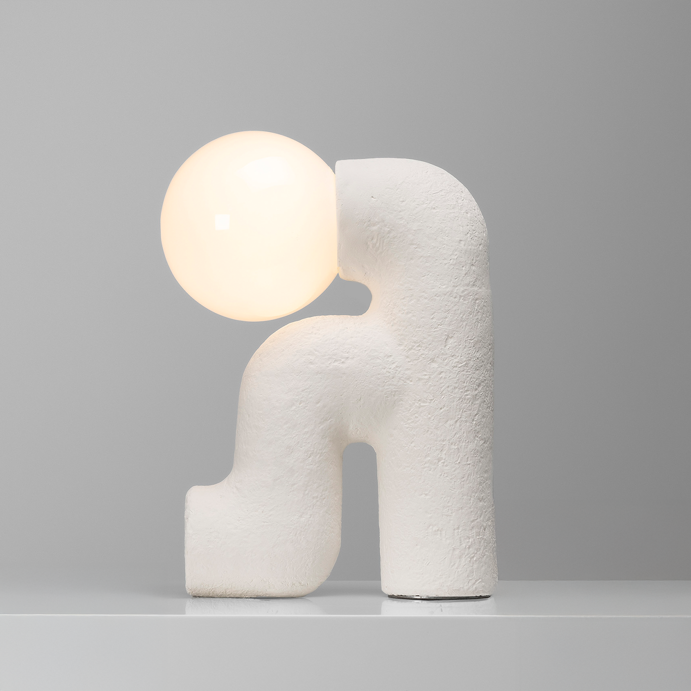 Erynghi Pendant Lamp, with its organic, asymmetrical form, flows like a sculpted gesture and defies convention. Transforming space with Elisa Uberti’s signature spontaneity, this pendant is a luminous celebration of individuality and textural expression, inviting those who live freely to experience light as art.